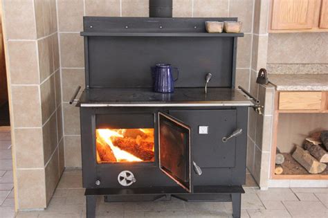 It’s best to do this when the <strong>wood-burning cook stove</strong> is cool, or the draft will keep pulling the soot back in. . Amish wood burning cook stoves